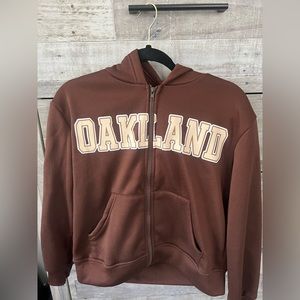brown zip up